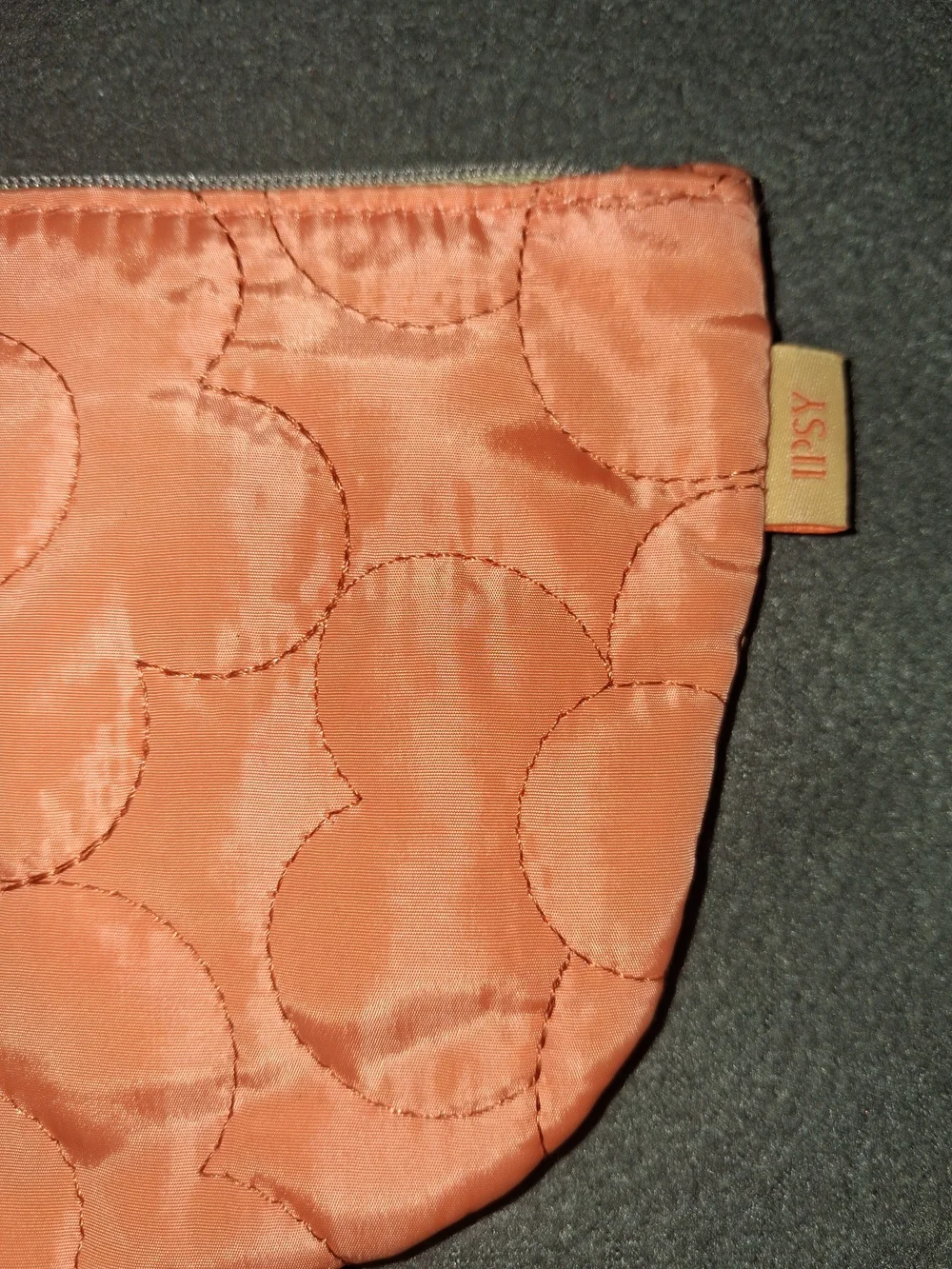 ipsy Orange Quilted Cosmetic Pouch with Blue Flower Zipper Pull